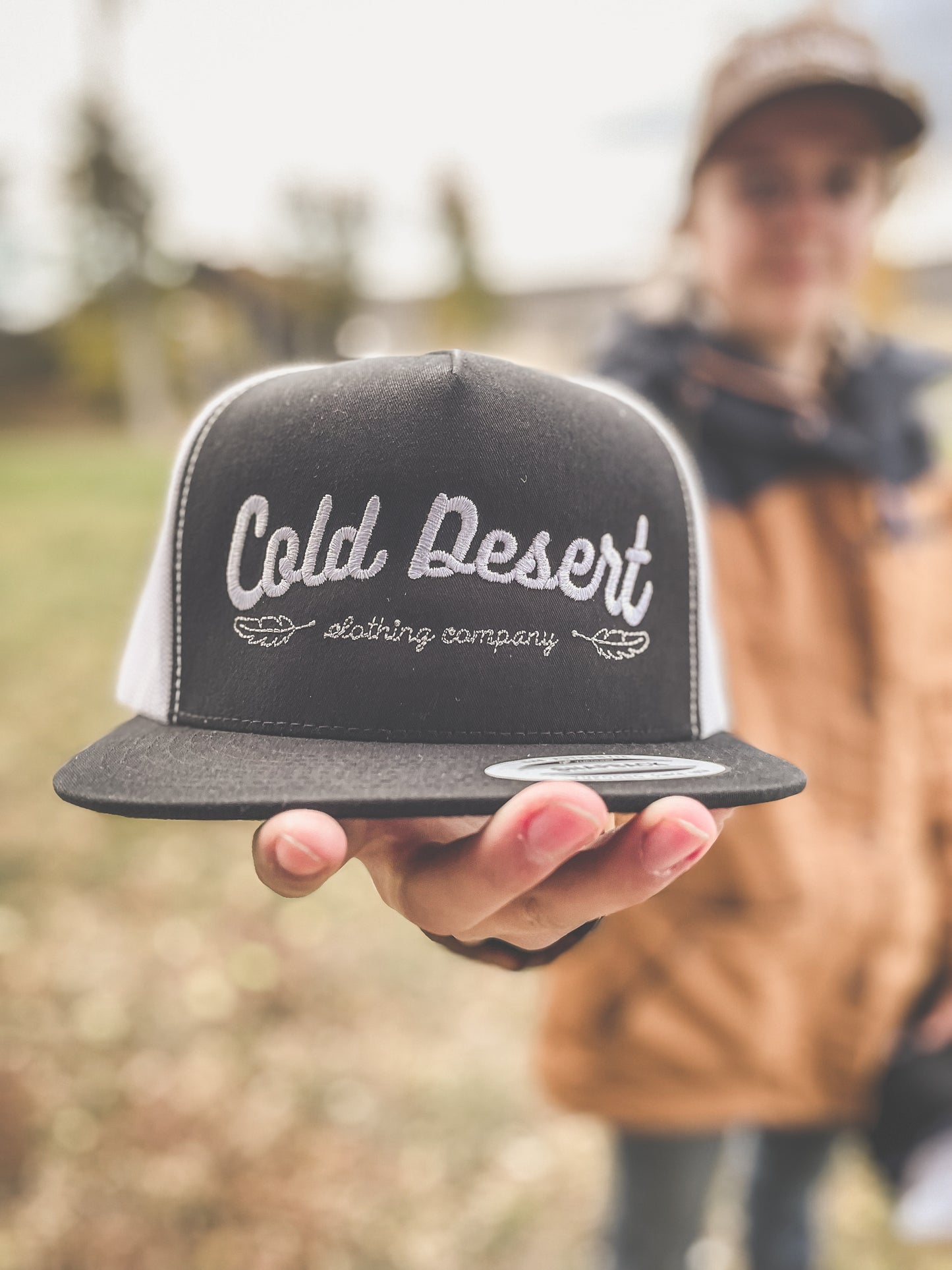 Cold Desert Feather Trucker Cap