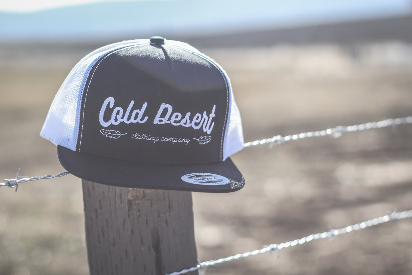 Cold Desert Feather Trucker Cap